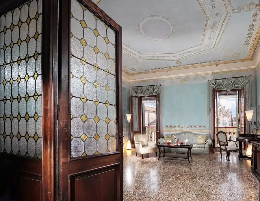 Suite — the leaded-glass doors